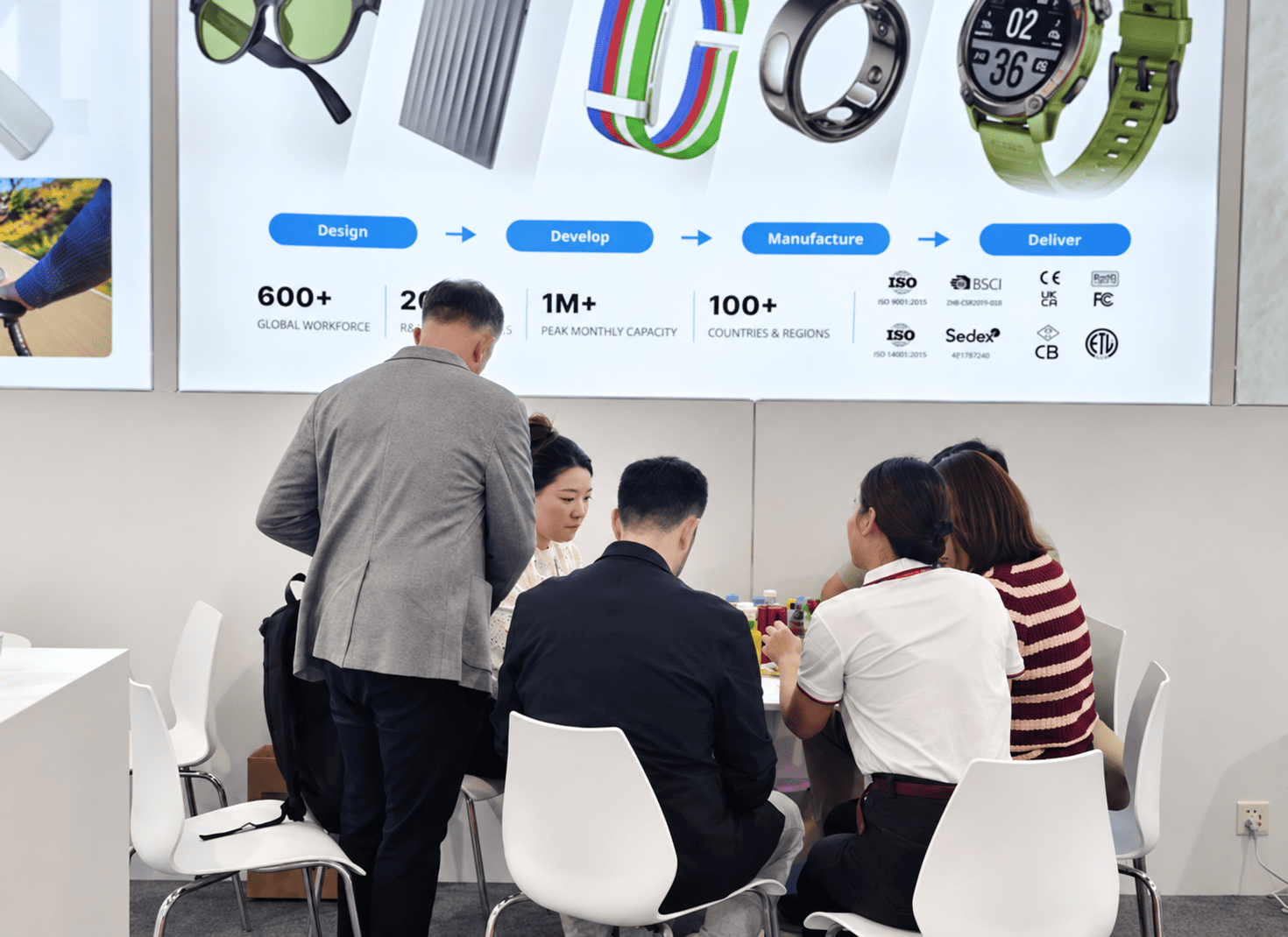Our team discussing custom smartwatch OEM/ODM projects with international buyers at Booth 5A19